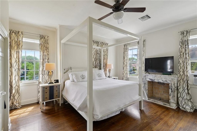 4008 Vendome Pl, New Orleans, LA 70125 - bedroom with visible vents, baseboards, ornamental molding, and wood finished floors