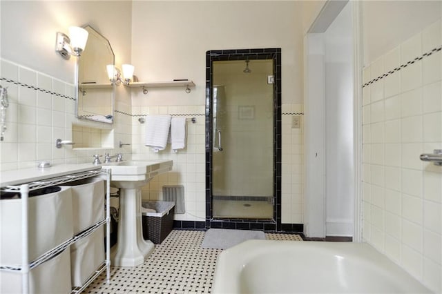4008 Vendome Pl, New Orleans, LA 70125 - bathroom with a bath, tile walls, and a stall shower