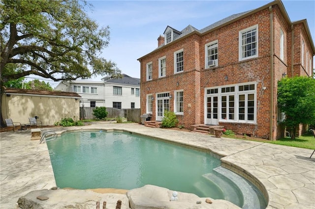 4008 Vendome Pl, New Orleans, LA 70125 - view of swimming pool with a fenced in pool, a patio, entry steps, and fence