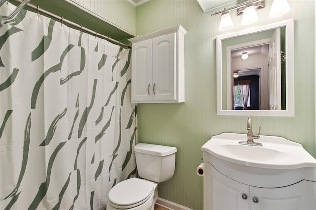 full bathroom with vanity, baseboards, toilet, and a shower with curtain