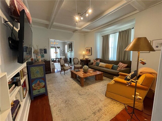 820 Solomon Pl, New Orleans, LA 70119 - living room with wood finished floors, coffered ceiling, a chandelier, and beam ceiling