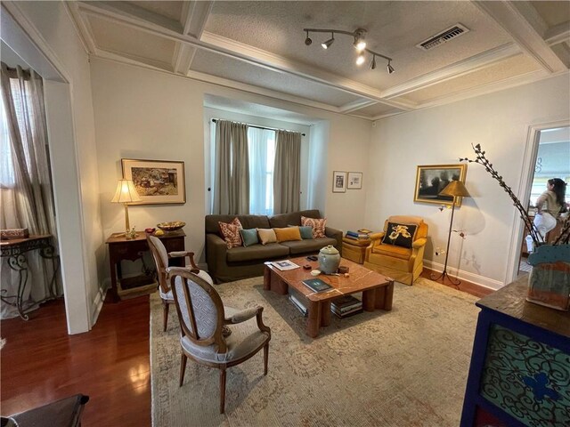 820 Solomon Pl, New Orleans, LA 70119 - living room with coffered ceiling, wood finished floors, crown molding, beamed ceiling, and baseboards