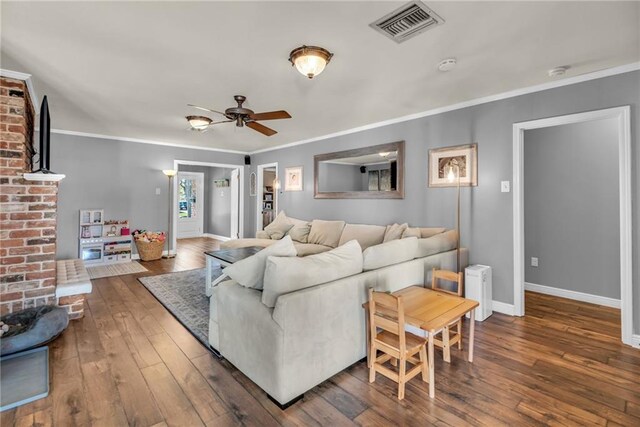 621 Gordon Ave, Harahan, LA 70123 - living area featuring hardwood / wood-style flooring, ceiling fan, baseboards, and visible vents