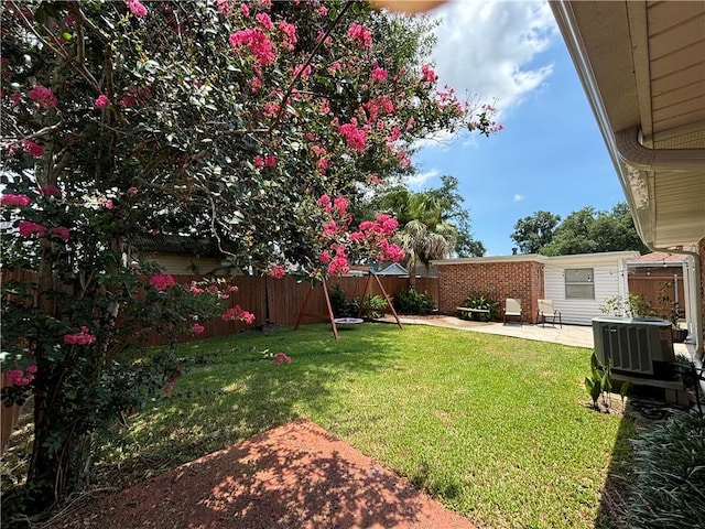 621 Gordon Ave, Harahan, LA 70123 - view of yard with a patio area, a fenced backyard, and cooling unit