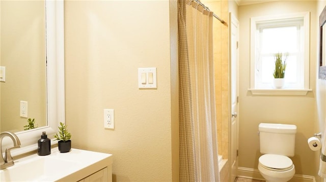 full bathroom with shower / bath combo, toilet, and vanity