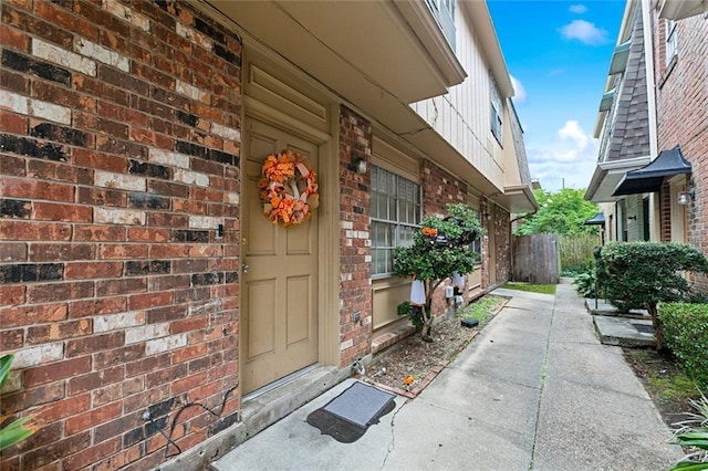 2205 Giuffrias Ave, Metairie, LA 70001 - view of exterior entry featuring brick siding and fence