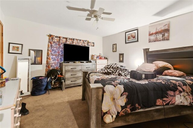 2205 Giuffrias Ave, Metairie, LA 70001 - carpeted bedroom with a ceiling fan