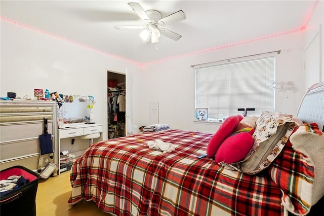 2205 Giuffrias Ave, Metairie, LA 70001 - bedroom featuring a walk in closet, a closet, and ceiling fan