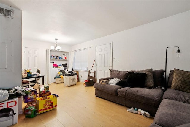 2205 Giuffrias Ave, Metairie, LA 70001 - living area featuring visible vents and wood finished floors