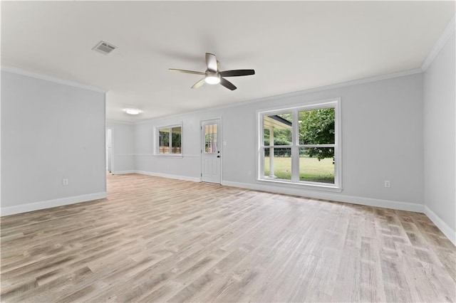 unfurnished living room featuring ceiling fan, ornamental molding, baseboards, and light wood-style floors