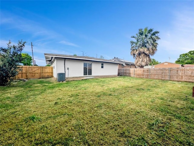 709 29th St, Kenner, LA 70062 - view of yard featuring central AC and a fenced backyard