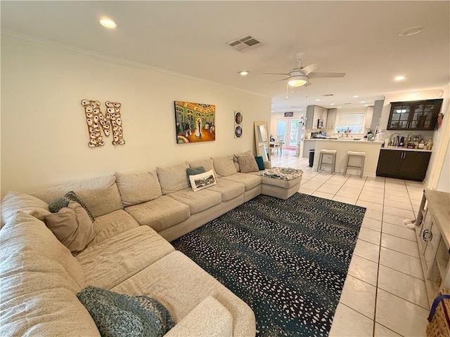 1101 Belmont Pl, Metairie, LA 70001 - living room featuring ceiling fan, ornamental molding, visible vents, recessed lighting, and light tile patterned flooring