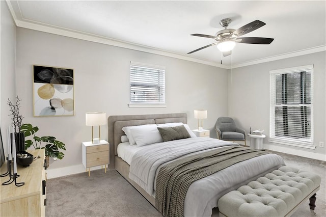 bedroom with crown molding, a ceiling fan, baseboards, and light colored carpet