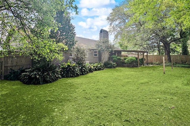 view of yard with fence
