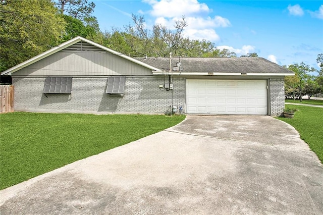 single story home featuring fence, an attached garage, brick siding, a front yard, and concrete driveway