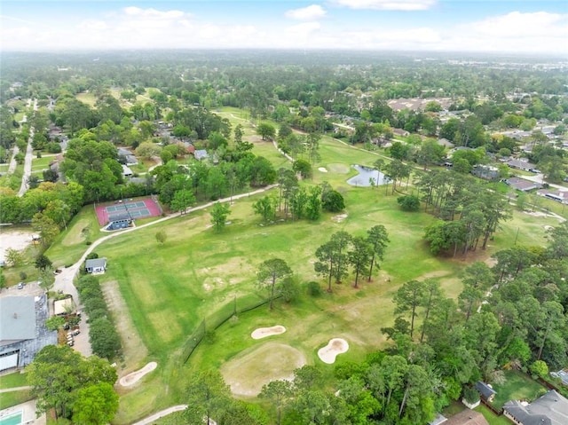 bird's eye view featuring a water view and view of golf course