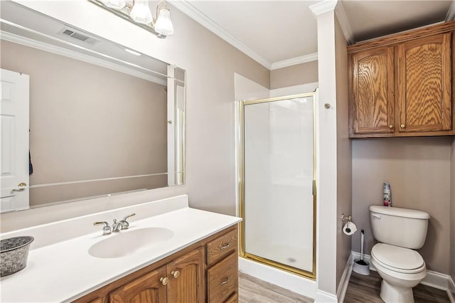 32875 Rivergate Cir Unit 28, Springfield, LA 70462 - full bath featuring crown molding, a shower stall, wood finished floors, toilet, and vanity
