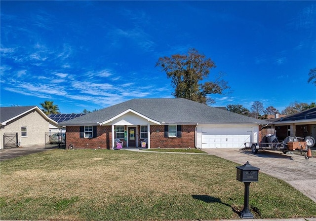 single story home featuring an attached garage, driveway, a front lawn, and brick siding