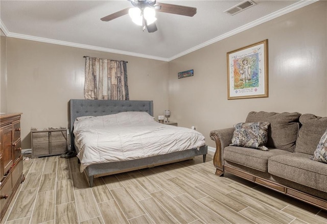 bedroom with visible vents, wood tiled floor, baseboards, and ornamental molding