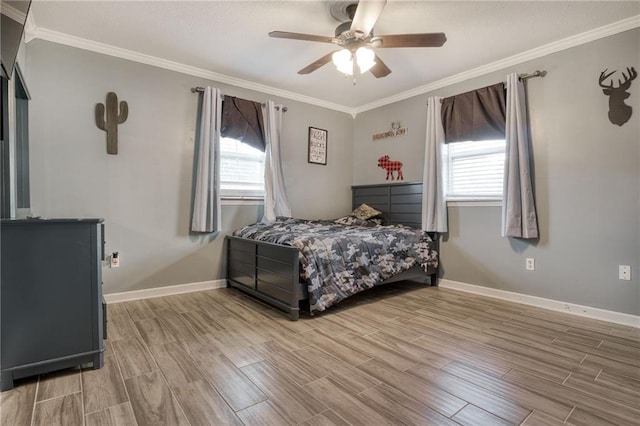 bedroom with crown molding, multiple windows, and wood finished floors