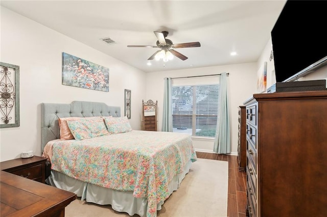 669 Fairfield Loop, Slidell, LA 70461 - bedroom with wood tiled floors, recessed lighting, baseboards, and a ceiling fan