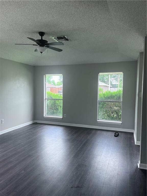 1921 Cartier Dr, La Place, LA 70068 - unfurnished room featuring visible vents, baseboards, plenty of natural light, a textured ceiling, and a ceiling fan