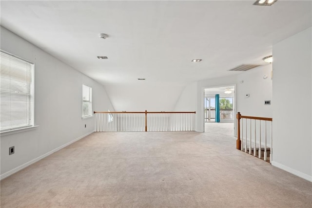 1091 Marina Dr, Slidell, LA 70458 - carpeted empty room featuring visible vents, baseboards, and plenty of natural light