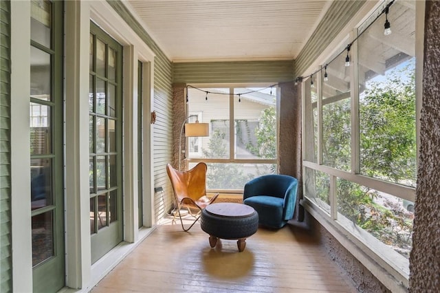 2227 Wirth Pl, New Orleans, LA 70115 - sunroom / solarium featuring plenty of natural light, hardwood / wood-style flooring, and ornamental molding