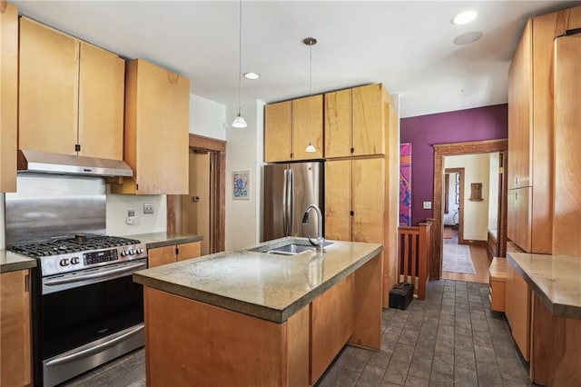 2227 Wirth Pl, New Orleans, LA 70115 - kitchen with a sink, a kitchen island with sink, under cabinet range hood, recessed lighting, and stainless steel appliances