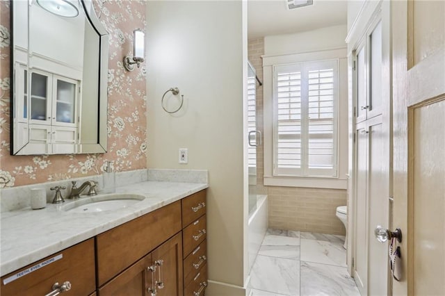 2227 Wirth Pl, New Orleans, LA 70115 - bathroom featuring vanity, wallpapered walls, toilet, visible vents, and marble finish floor