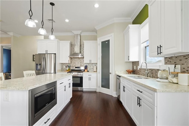 85 W Claiborne Sq, Chalmette, LA 70043 - kitchen with wall chimney exhaust hood, ornamental molding, white cabinetry, a sink, and stainless steel appliances