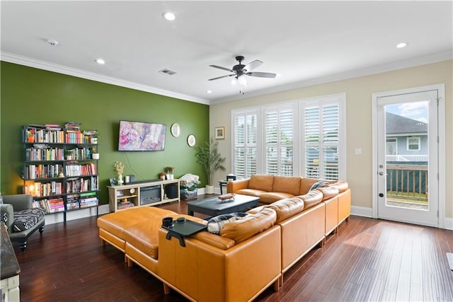 85 W Claiborne Sq, Chalmette, LA 70043 - living room featuring crown molding, ceiling fan, plenty of natural light, and wood finished floors