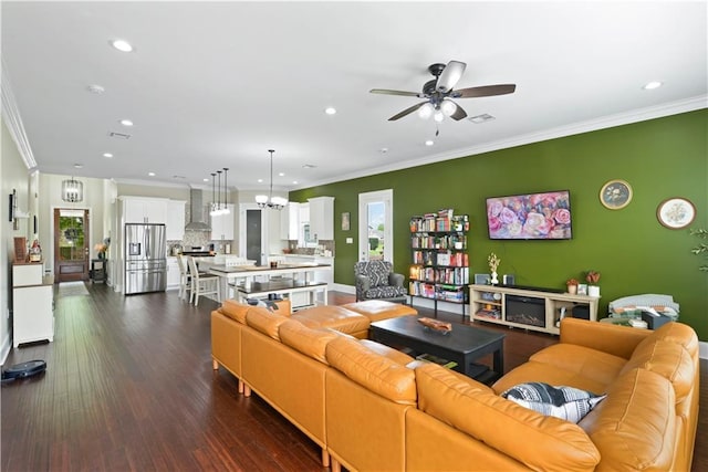 85 W Claiborne Sq, Chalmette, LA 70043 - living area featuring dark wood-type flooring, visible vents, a ceiling fan, and recessed lighting