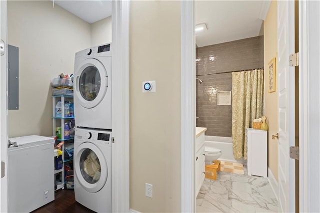 85 W Claiborne Sq, Chalmette, LA 70043 - clothes washing area with laundry area, stacked washer and clothes dryer, marble finish floor, and electric panel