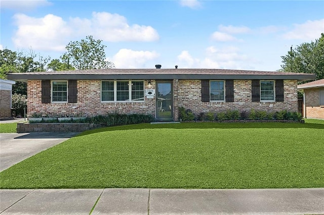 2344 Mississippi Ave, Metairie, LA 70003 - ranch-style home featuring a front yard and brick siding