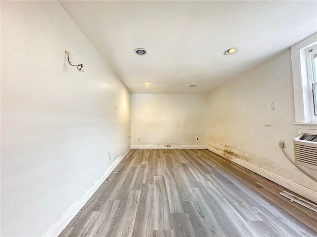 165355 Treasure St, New Orleans, LA 70119 - empty room featuring light wood-style floors and recessed lighting