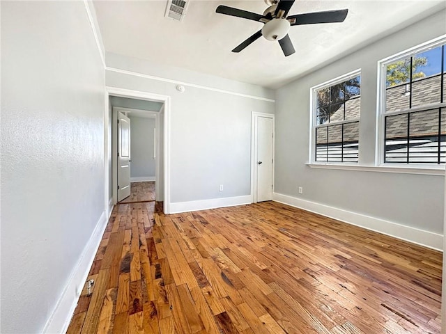 165355 Treasure St, New Orleans, LA 70119 - empty room featuring hardwood / wood-style floors and a ceiling fan