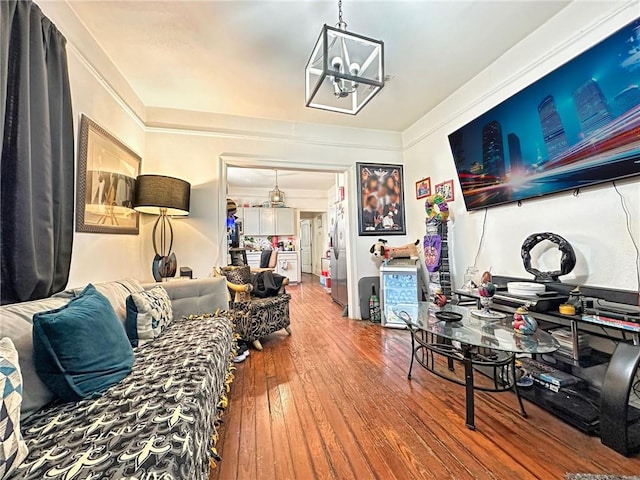 165355 Treasure St, New Orleans, LA 70119 - living area featuring hardwood / wood-style floors, a chandelier, and crown molding