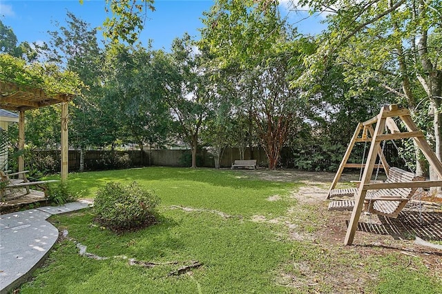 view of yard with a pergola and a fenced backyard