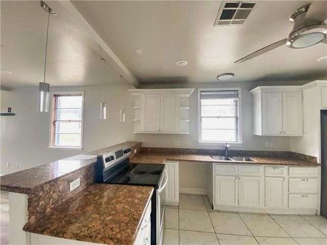 2359 Prentiss Ave, New Orleans, LA 70122 - kitchen with open shelves, visible vents, stainless steel range with electric cooktop, a healthy amount of sunlight, and a sink
