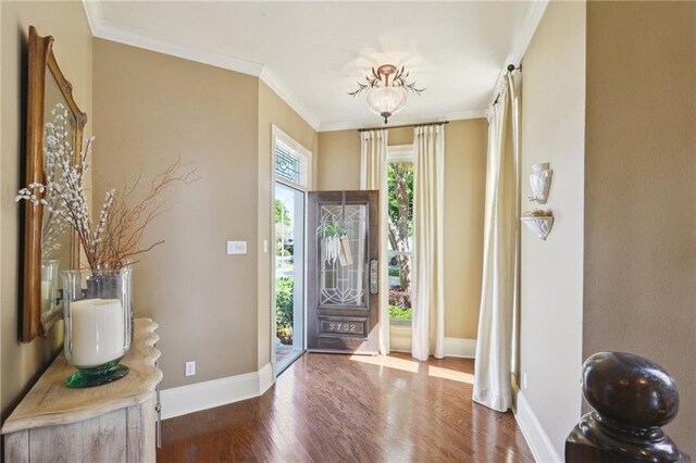 3752 Lake Charles Dr, Gretna, LA 70056 - foyer entrance with ornamental molding, baseboards, and wood finished floors