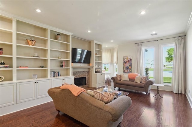 3752 Lake Charles Dr, Gretna, LA 70056 - living area featuring a fireplace, dark wood-type flooring, and a healthy amount of sunlight