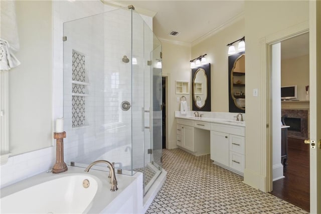 3752 Lake Charles Dr, Gretna, LA 70056 - full bath with a bath, visible vents, a sink, a stall shower, and double vanity