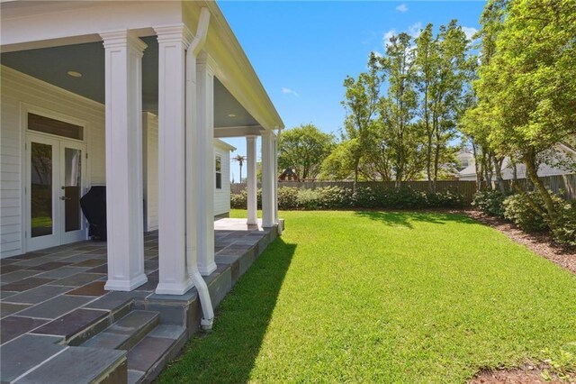 3752 Lake Charles Dr, Gretna, LA 70056 - view of yard featuring a patio area, french doors, and fence
