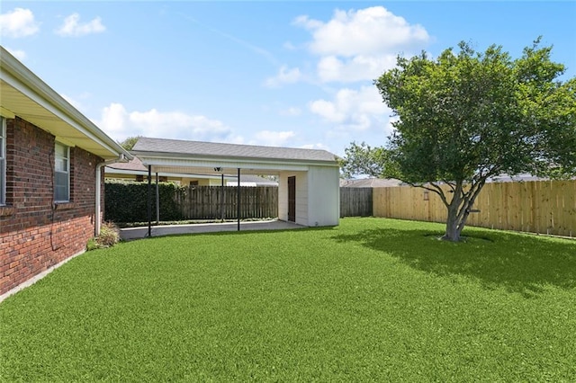 view of yard featuring a fenced backyard