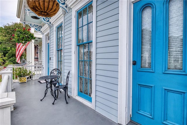 doorway to property with covered porch