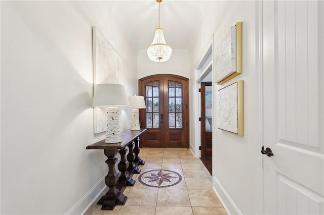 809 S Corniche Du Lac, Covington, LA 70433 - tiled foyer entrance with a chandelier, french doors, and crown molding