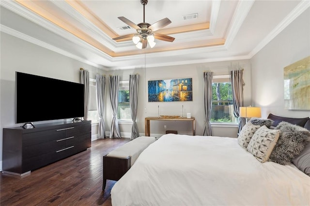 809 S Corniche Du Lac, Covington, LA 70433 - bedroom with a raised ceiling, ornamental molding, dark wood finished floors, and ceiling fan