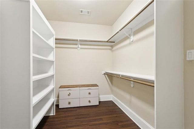 809 S Corniche Du Lac, Covington, LA 70433 - walk in closet featuring dark wood finished floors