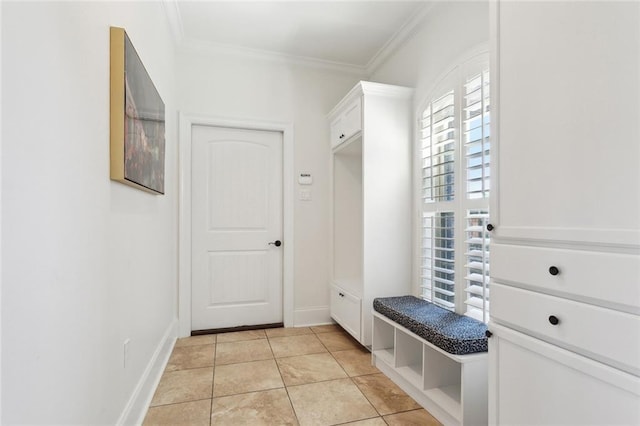 809 S Corniche Du Lac, Covington, LA 70433 - mudroom featuring crown molding and light tile patterned floors